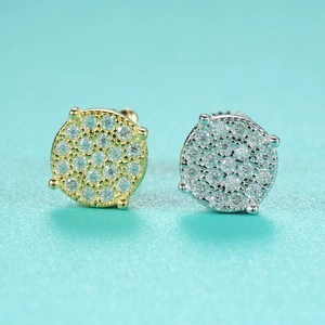 Macro shot of Moissanite studs in gold and silver plating with micro-pave setting