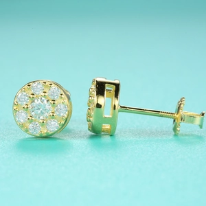 Macro view of gold-plated S925 sterling silver moissanite stud earrings with screw-back design