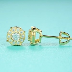 Macro shot of Moissanite halo stud earrings with gold finish and secure screw backings