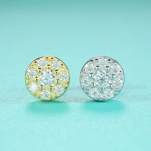 Detailed close-up of hip-hop moissanite stud earrings in gold and silver finish