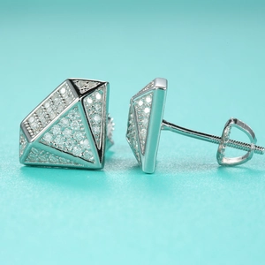 Macro view of geometric S925 silver moissanite studs with secure screw-back design