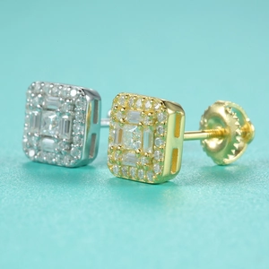 Macro detail of hip hop square S925 silver and gold earrings with pavé moissanite stones