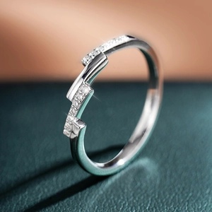 Detail view of S925 sterling silver asymmetric ring with shimmering micro-pave zircons