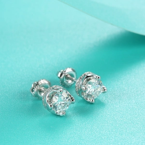 Macro shot of S925 sterling silver moissanite studs with crown setting and screw back