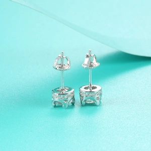Macro shot of S925 sterling silver moissanite stud earrings with a crown setting design