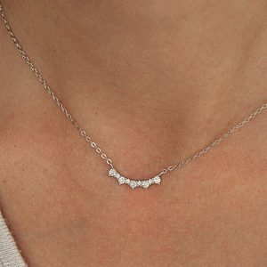 Sparkling S925 sterling silver clavicle necklace with curved pavé moissanite pendant