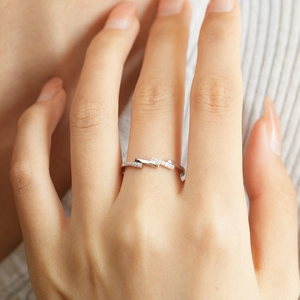 S925 sterling silver asymmetrical ring with sparkling stones in a modern geometric style
