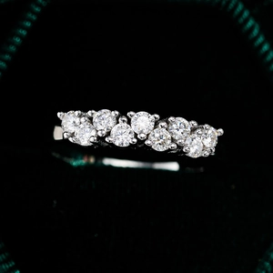 Elegant S925 sterling silver ring with nine sparkling round moissanite stones