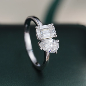 Classic 925 silver ring featuring emerald and pear cut 1 carat moissanite stones