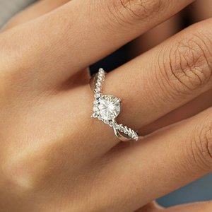 S925 sterling silver asymmetrical 1-carat moissanite ring with twisted pavé band on finger