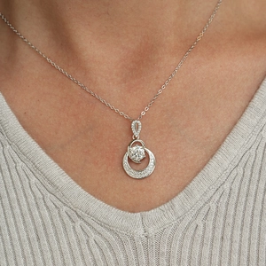 S925 sterling silver necklace with 1 carat moissanite pendant on elegant model