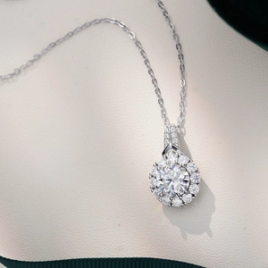 Elegant S925 sterling silver necklace with a 2-carat round moissanite pendant on white leather