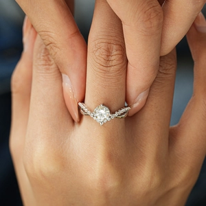 Asymmetrical S925 sterling silver crown ring with a 1-carat round moissanite stone