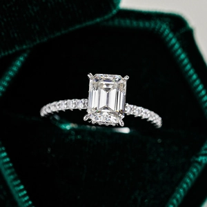 S925 sterling silver ring with 1ct emerald cut moissanite in a green velvet box