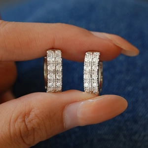 Classic S925 sterling silver hoop earrings featuring double rows of moissanite stones