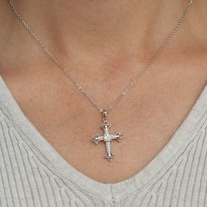 925 sterling silver moissanite large cross pendant necklace worn on a silver chain