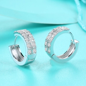 Close-up of S925 sterling silver hoop earrings with double-row moissanite micro-paving
