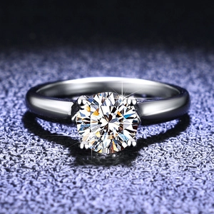 Classic S925 sterling silver four-prong solitaire ring with a large brilliant round cut stone