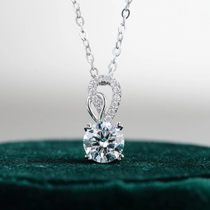 Classic S925 sterling silver necklace with 1 carat round moissanite in 4-prong setting
