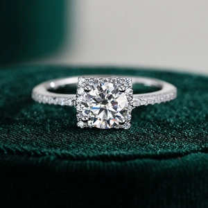 Classic S925 sterling silver ring with 1ct moissanite and halo setting on velvet