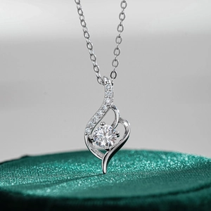 Classic S925 sterling silver necklace with a 0.5ct moissanite wave pendant for women