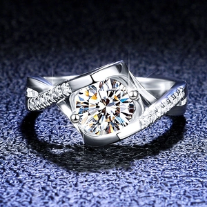 Macro shot of S925 silver moissanite ring with twisted band and sparkling round center stone