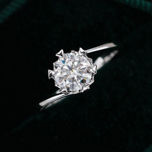 Classic 6-prong moissanite snowflake silver ring in a luxury green velvet jewelry box
