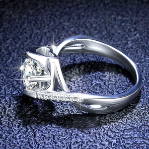 Macro view of s925 silver moissanite ring showing twisted band and heart-shaped setting