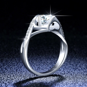 Macro detail of S925 sterling silver ring with moissanite, heart setting and twisted band