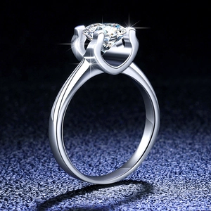 Macro shot of s925 silver ring featuring a sparkling moissanite in four-prong setting