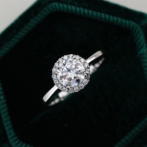 Classic 925 sterling silver halo ring with a 1ct round moissanite in a green velvet box