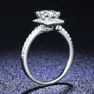 Macro view of S925 sterling silver ring featuring a four-prong halo set moissanite diamond