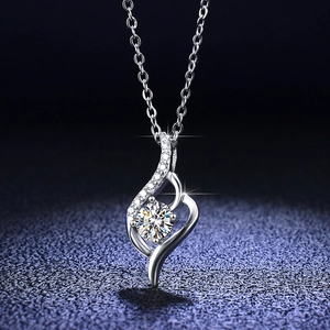 Macro shot of s925 sterling silver necklace with a brilliant 0.5ct moissanite pendant
