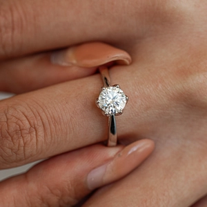 Classic six-prong S925 sterling silver moissanite ring with a brilliant round cut stone