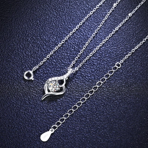 Macro detail of s925 silver heart pendant necklace with moissanite and Pt950 hallmark