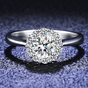 Macro shot of 925 sterling silver ring with a 1ct round halo moissanite setting