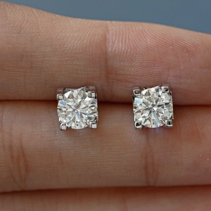 S925 sterling silver moissanite stud earrings featuring round brilliant cut stones