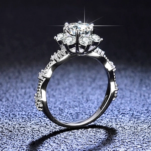 Sterling silver sun flower engagement ring with 5 carat moissanite and twisted pavé band