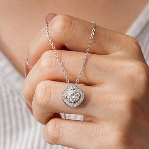 Elegant S925 sterling silver necklace with a square halo moissanite pendant on a model