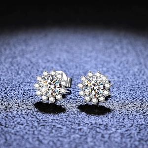 Macro view of S925 silver sunflower earrings featuring sparkling moissanite stones