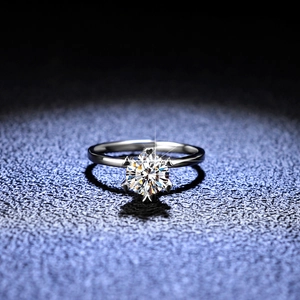 Elegant 925 sterling silver ring with 6-prong moissanite setting and heart detail