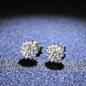 Macro shot of S925 silver sunflower stud earrings with brilliant moissanite center stones