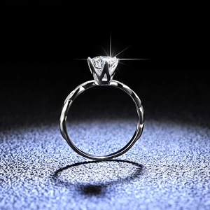 Classic 925 sterling silver moissanite ring with a six-prong setting and twisted band design