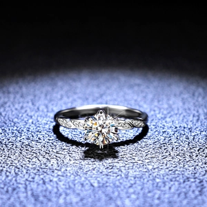 Elegant 925 sterling silver moissanite ring with six-prong setting and twisted diamond band