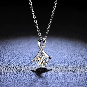 Macro shot of s925 silver pendant necklace with sparkling moissanite main stone