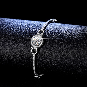 Elegant 925 sterling silver bracelet featuring a brilliant round moissanite centerpiece