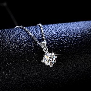 Elegant s925 silver necklace with 1 carat round moissanite in classic four-prong setting