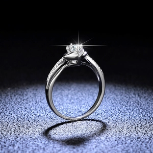 D color moissanite flower ring in polished silver with sparkling split shank band