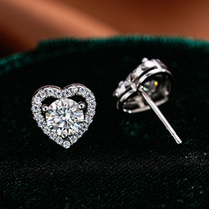 S925 sterling silver heart-shaped moissanite stud earrings with halo setting on velvet