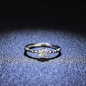 Adjustable sterling silver moissanite ring with four-prong set round stone and beaded band
